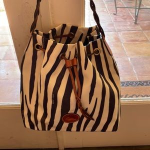 Ladies perfectly new Dooney & Bourke Satchel. Zebra pattern. Super Cute